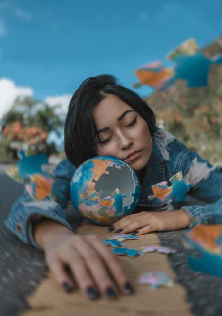 Woman holding a puzzle piece